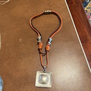 Silver Pendant on Leather Necklace